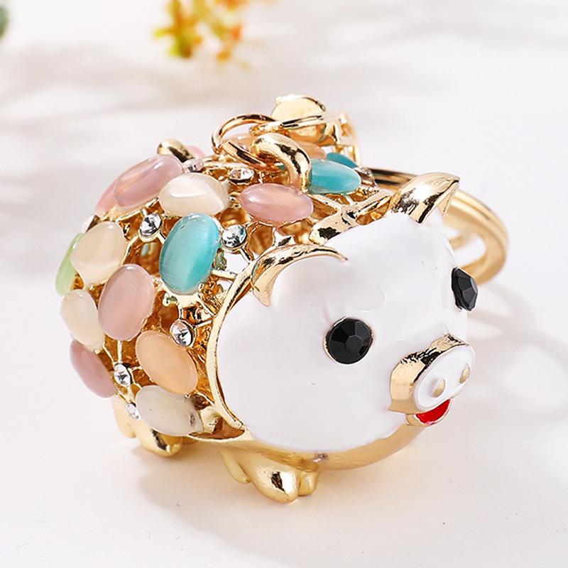 Korean version creative cat eye pig keychain, cute, diamond studded, little pig, zodiac sign, pendant, small animal women s bag decoration
Korean version creative cat eye pig keychain, cute, diamond studded, little pig, zodiac sign, pendant, small animal women s bag decoration