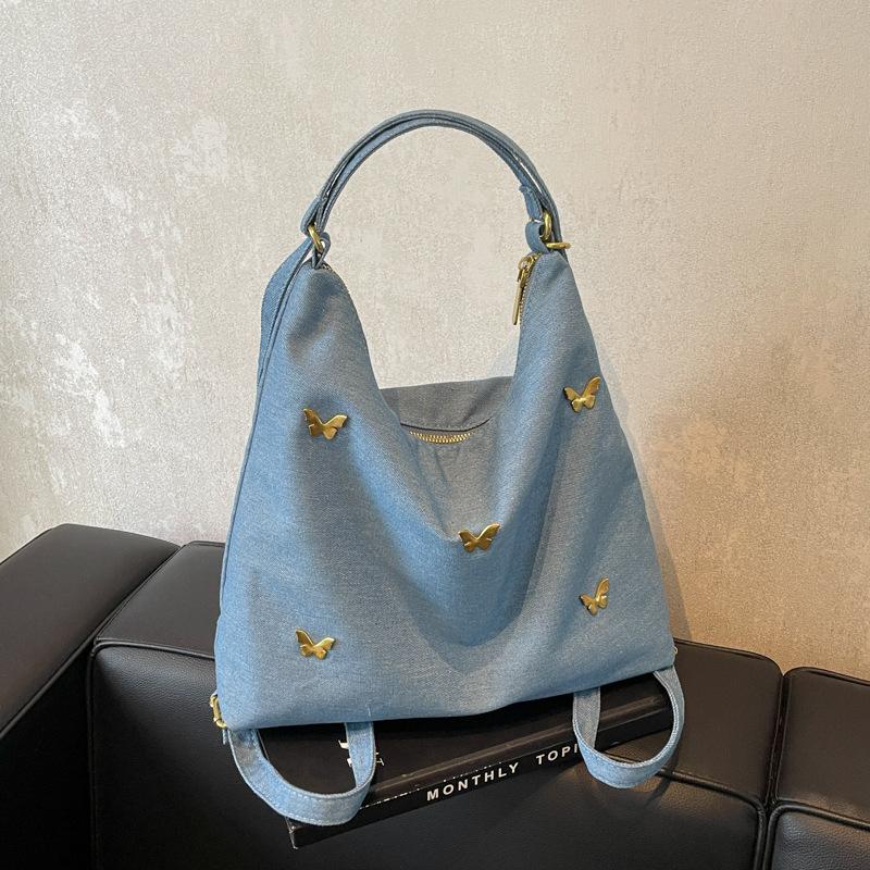 2024 new autumn and winter denim cloth double shoulder crossbody small backpack large capacity commuter single shoulder tote bag women світло-синій колір
2024 new autumn and winter denim cloth double shoulder crossbody small backpack large capacity commuter single shoulder tote bag women світло-синій колір