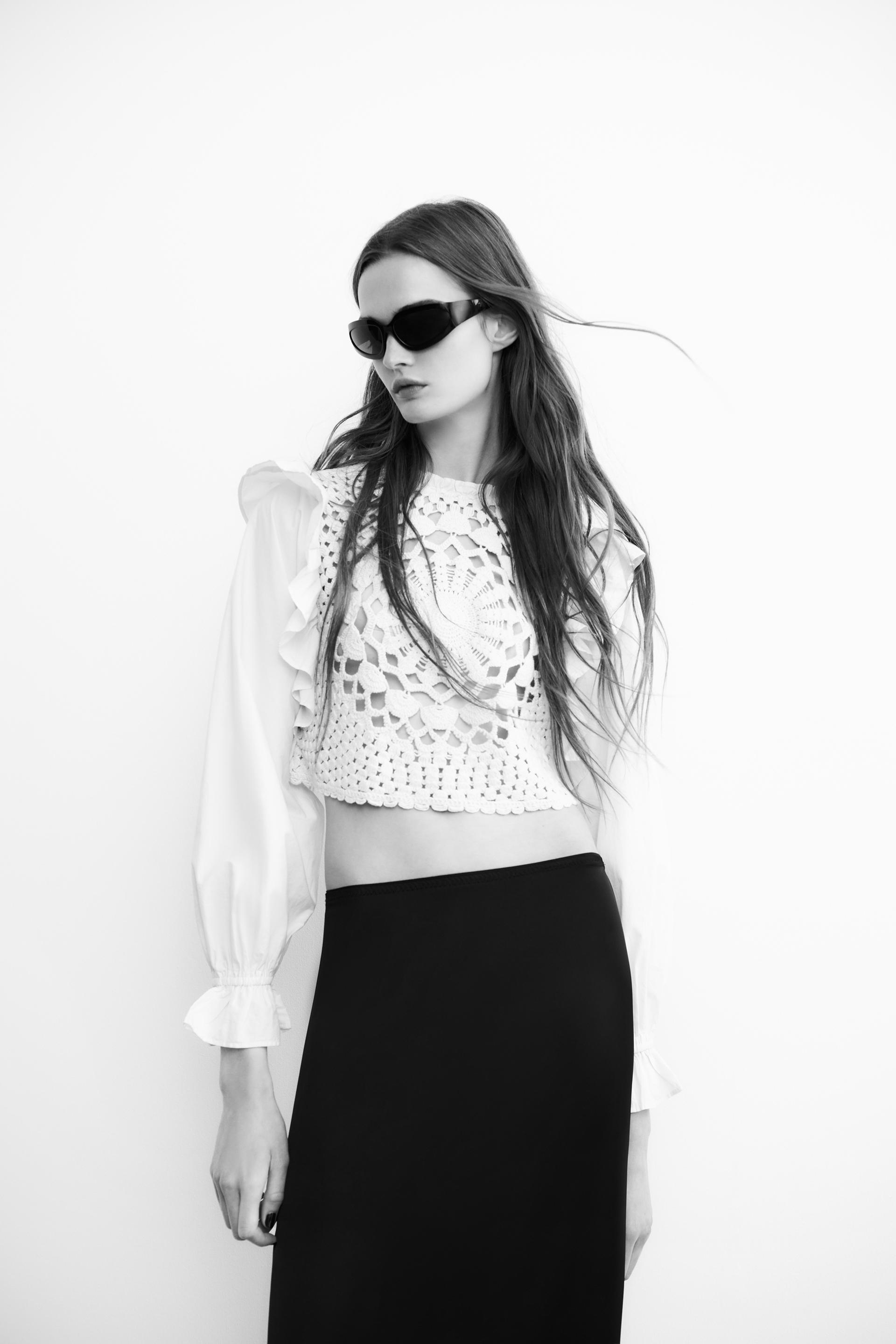 CONTRAST KNIT TOP WITH RUFFLED SLEEVES
CONTRAST KNIT TOP WITH RUFFLED SLEEVES