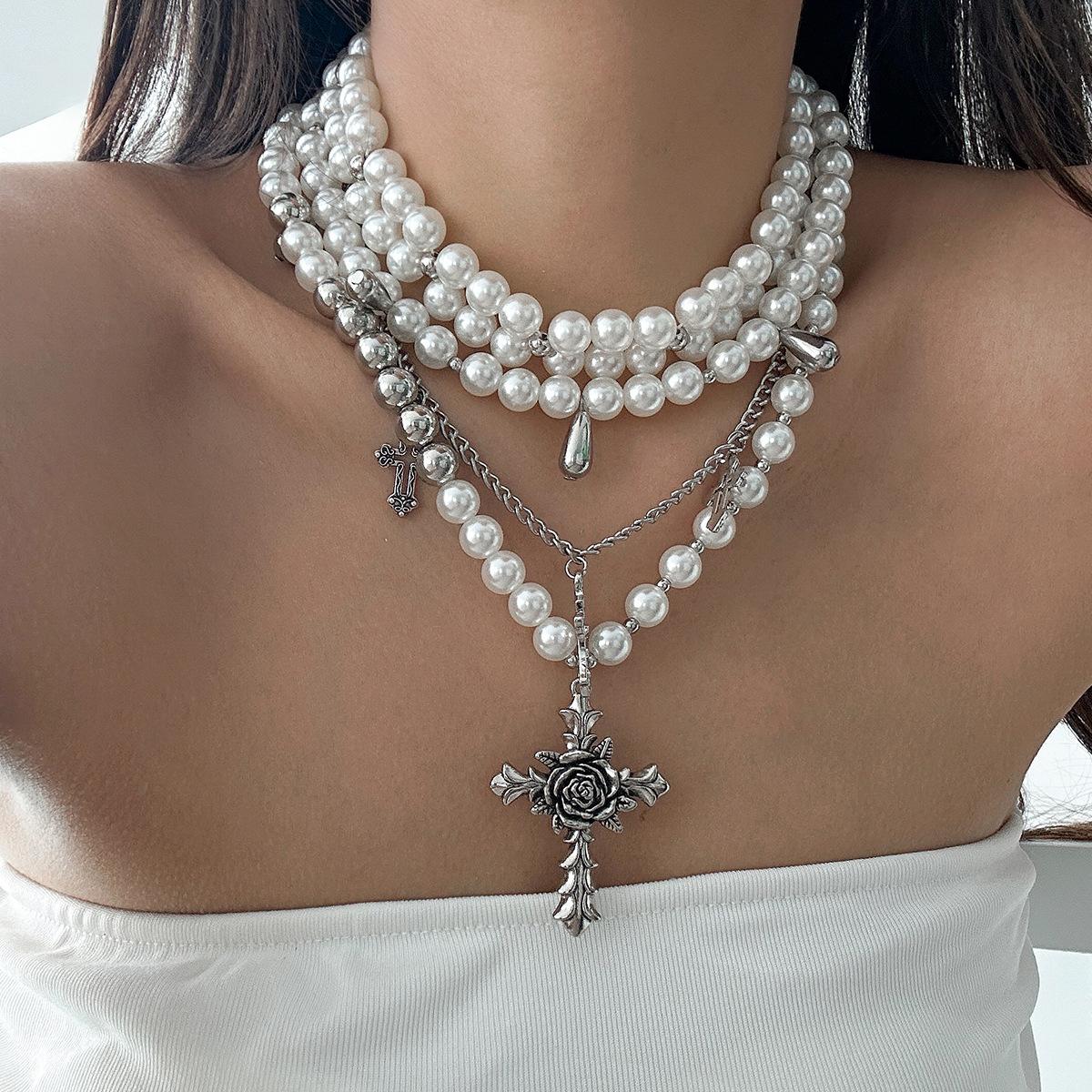 Sweet and cool exaggerated thorn rose cross pendant necklace female, personalized stacking wearing imitation pearl necklace
Sweet and cool exaggerated thorn rose cross pendant necklace female, personalized stacking wearing imitation pearl necklace