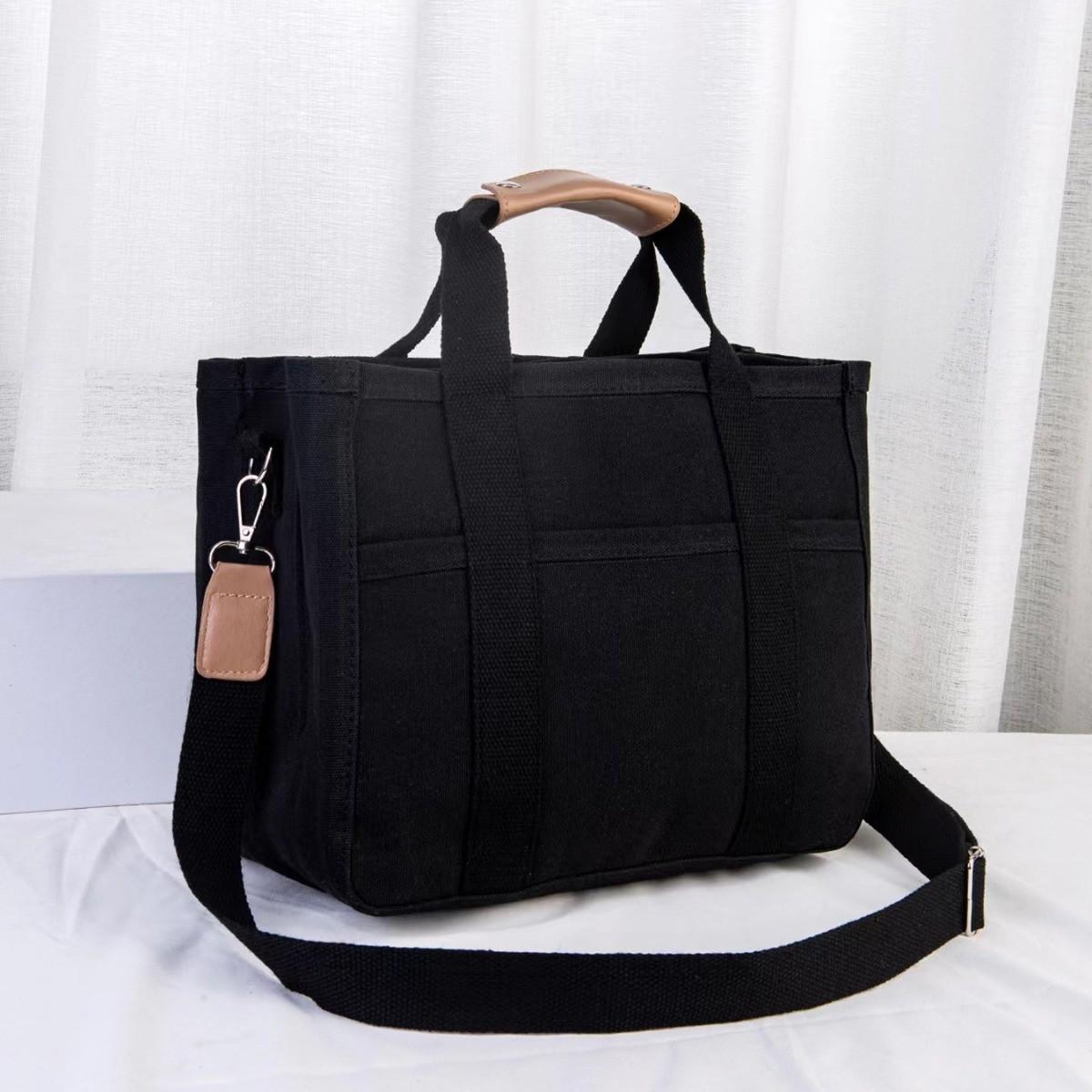 Simple canvas handbag New versatile multi-layer high-capacity commuting shoulder messenger women s bag
Simple canvas handbag New versatile multi-layer high-capacity commuting shoulder messenger women s bag