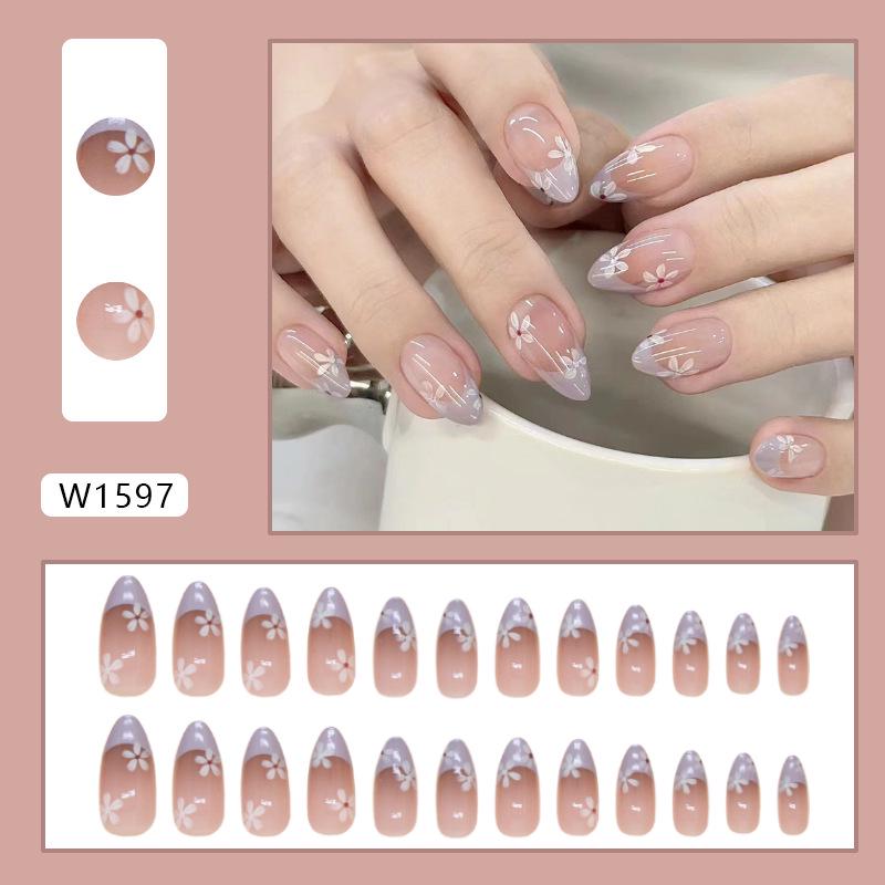 Съемные короткие миндалевидные накладные ногти с цветочным дизайном
Съемные короткие миндалевидные накладные ногти с цветочным дизайном