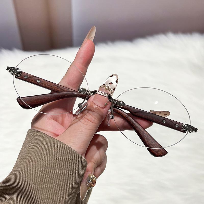 2026 New Rimless Oval Sunglasses for Women Luxury Retro Diamond Decor Fashion Designer Shades UV400 High-End Personality Eyewear
2026 New Rimless Oval Sunglasses for Women Luxury Retro Diamond Decor Fashion Designer Shades UV400 High-End Personality Eyewear