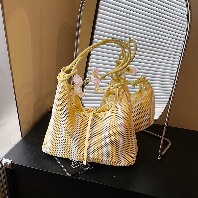 Нишевая полая сетчатая сумка-мешок женская новая модная универсальная сумка-мессенджер на плечо подмышку сумка-ведро жёлтый