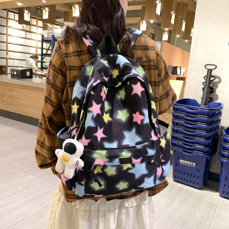 A Color-blocking Striped Backpack for Female High School Students and Junior High School Students with pendant
A Color-blocking Striped Backpack for Female High School Students and Junior High School Students with pendant