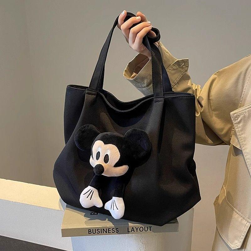 Canvas bag Female college student portable satchel Versatile largecapacity class bag Casual simple hand carry cartoon shoulder bag
Canvas bag Female college student portable satchel Versatile largecapacity class bag Casual simple hand carry cartoon shoulder bag