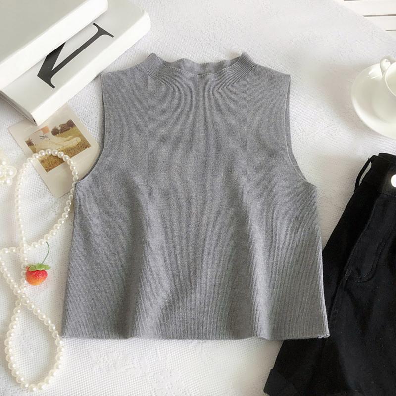 Жіноча безрукавка з напіввисоким коміром, кежуал
Жіноча безрукавка з напіввисоким коміром, кежуал