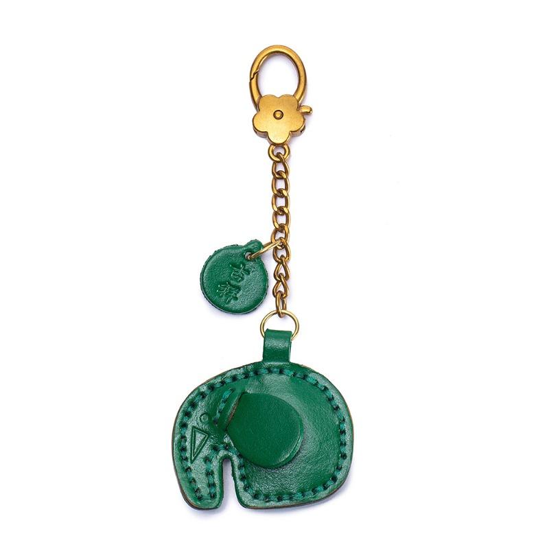 New leather cute baby elephant keychain creative fruit car key pendant first layer cowhide bag pendant
New leather cute baby elephant keychain creative fruit car key pendant first layer cowhide bag pendant