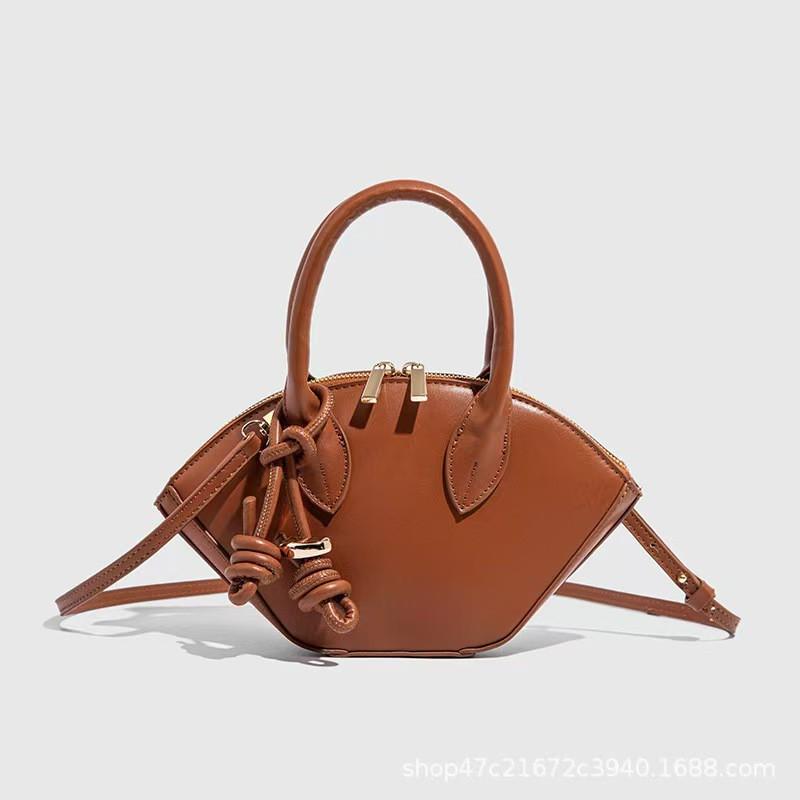 Z Family Cross-border Women s Bag 2025 New Fashionable High-end Portable Pendant Mini Shell Single-shoulder Cross-body коричневий
Z Family Cross-border Women s Bag 2025 New Fashionable High-end Portable Pendant Mini Shell Single-shoulder Cross-body коричневий
