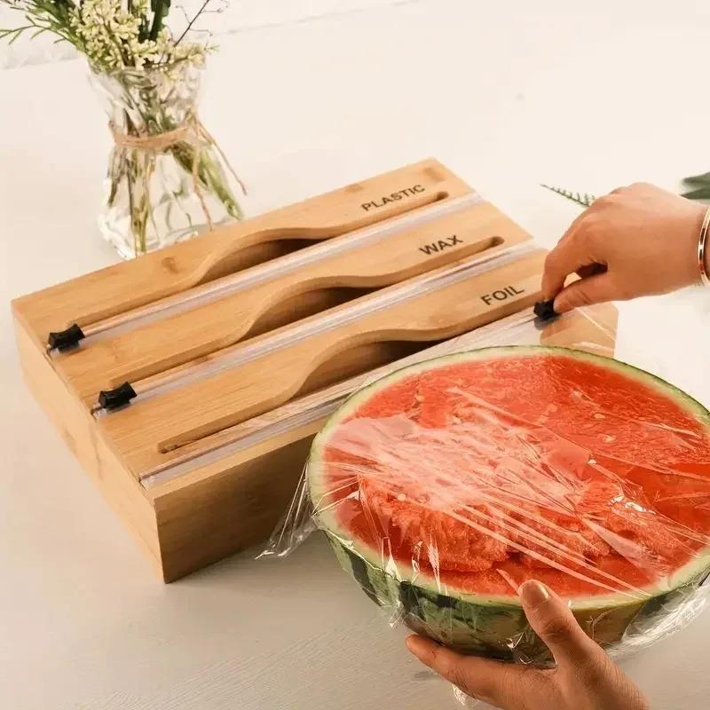New 3 in 1 Bamboo Wrap Organizer with Cutter and Labels Plastic Wrap Aluminum Foil and Wax Dispenser for Kitchen Storage
New 3 in 1 Bamboo Wrap Organizer with Cutter and Labels Plastic Wrap Aluminum Foil and Wax Dispenser for Kitchen Storage