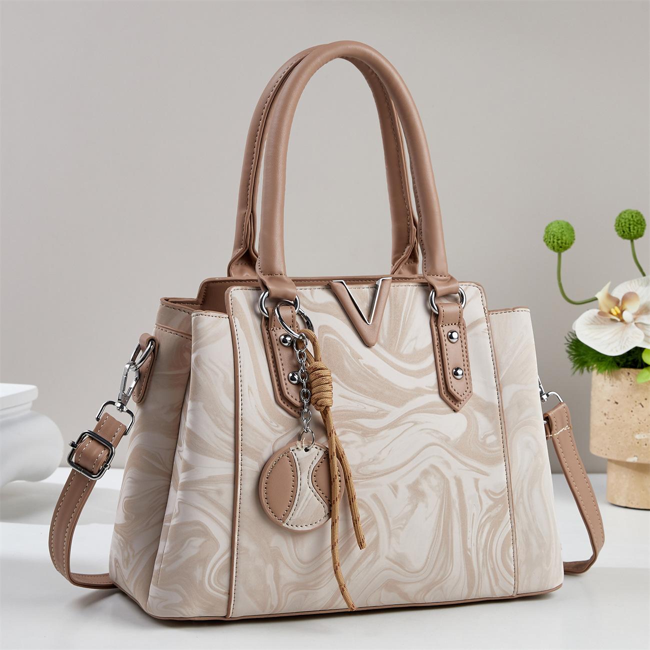 New Stylish Solid Color Structured Large Capacity Tassel Graffiti Shoulder Crossbody Bag For Women хакі
New Stylish Solid Color Structured Large Capacity Tassel Graffiti Shoulder Crossbody Bag For Women хакі