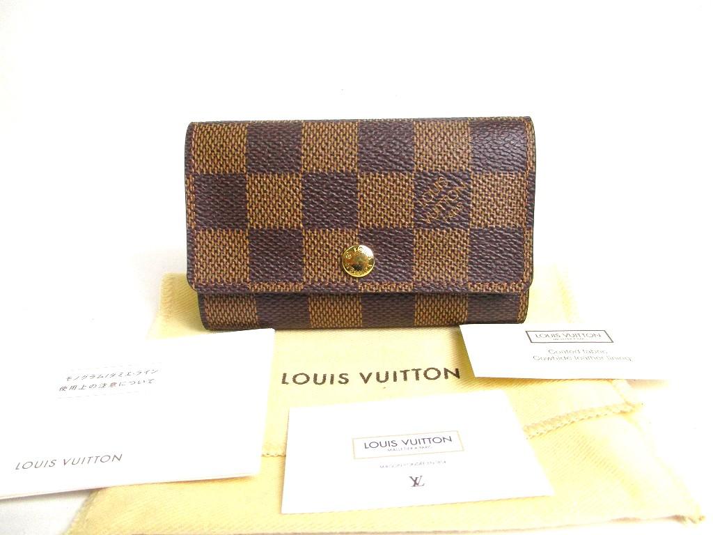 Автентичний брелок LOUIS VUITTON Damier із коричневої шкіри, 6 брелоків №a364, відремонтований
Автентичний брелок LOUIS VUITTON Damier із коричневої шкіри, 6 брелоків №a364, відремонтований