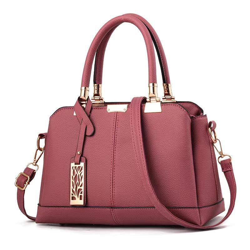 New bag fashion women s bag handbag middle-aged mother bag shoulder bag hot-selling bags темно-рожевого кольору
New bag fashion women s bag handbag middle-aged mother bag shoulder bag hot-selling bags темно-рожевого кольору