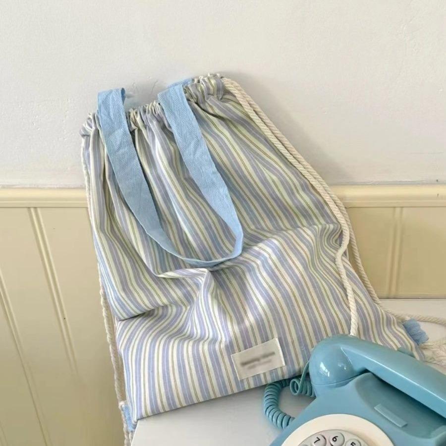 Striped contrasting color small fresh canvas bag class commuter bag high value shoulder tote bag drawstring backpack backpack синій
Striped contrasting color small fresh canvas bag class commuter bag high value shoulder tote bag drawstring backpack backpack синій
