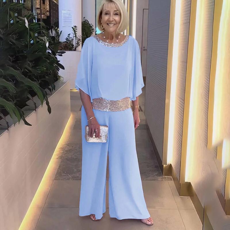 Комплект жіночий з 2 предметів: футболка з круглим вирізом, кольоровими блоками та паєтками, з рукавами-кажанами; широкі штани. Повсякденна футболка, вільні штани, елегантний костюм для ділових зустрічей, мода весна/літо 3XL світло-синій колір
Комплект жіночий з 2 предметів: футболка з круглим вирізом, кольоровими блоками та паєтками, з рукавами-кажанами; широкі штани. Повсякденна футболка, вільні штани, елегантний костюм для ділових зустрічей, мода весна/літо 3XL світло-синій колір