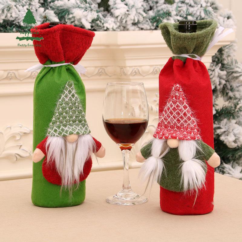 New Christmas red wine bottle set home table decoration products deep forest Santa Claus.
New Christmas red wine bottle set home table decoration products deep forest Santa Claus.
