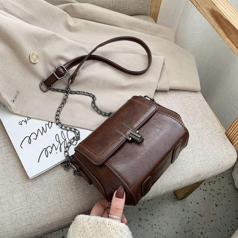 Hong Kong style retro small bag women s new trendy Korean version shoulder small square bag chain messenger bag women s versatile темно-коричневого кольору
Hong Kong style retro small bag women s new trendy Korean version shoulder small square bag chain messenger bag women s versatile темно-коричневого кольору
