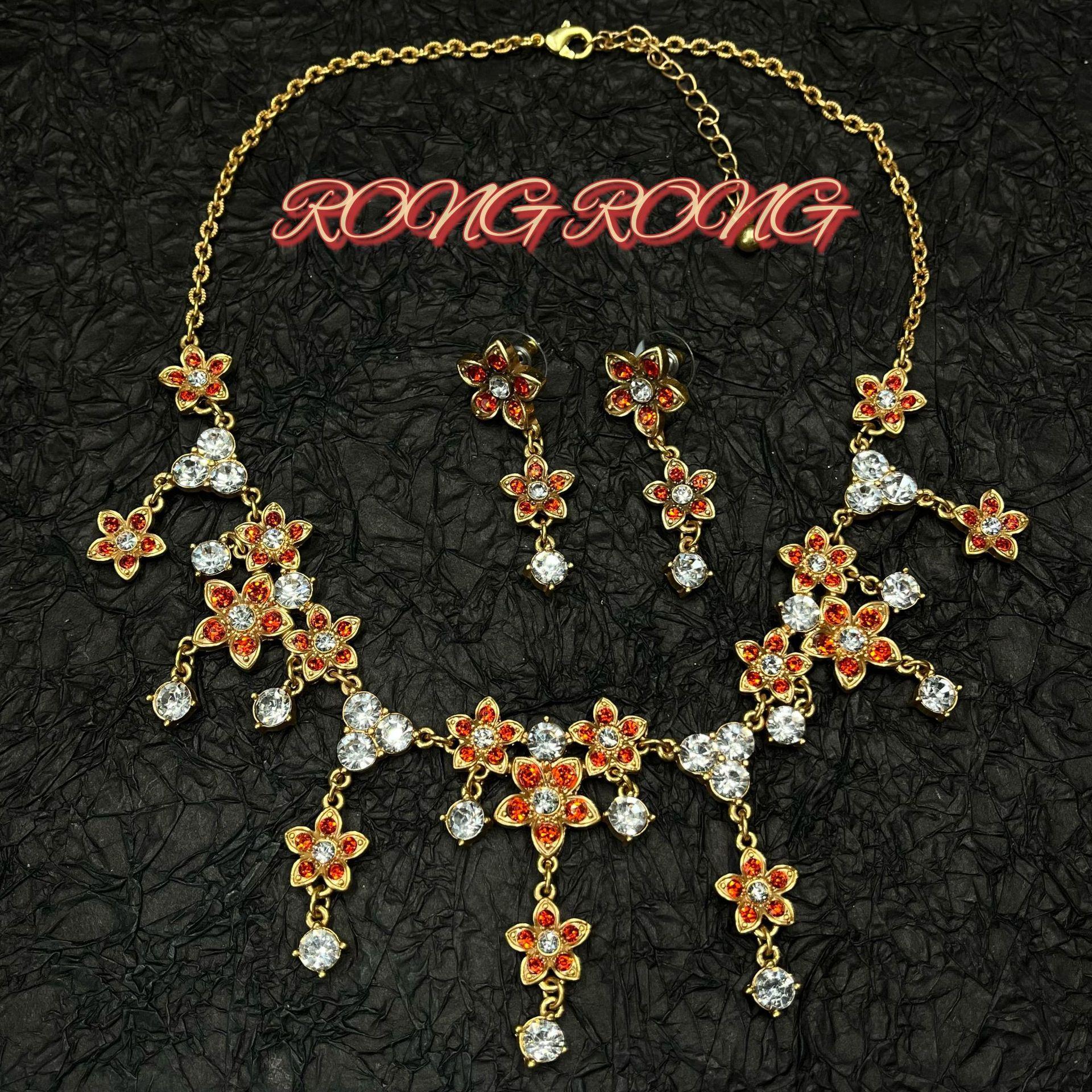 Medieval vintage colored diamond flower long earrings, European and American retro trend flower fringed necklace jewelry set
Medieval vintage colored diamond flower long earrings, European and American retro trend flower fringed necklace jewelry set