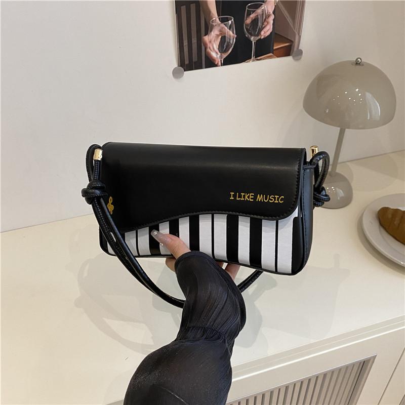 Модная маленькая квадратная женская сумка 2025 лето новая нота фортепианной музыки персонализированная сумка через плечо сумка-мессенджер милая портативная женская сумка чёрный
Модная маленькая квадратная женская сумка 2025 лето новая нота фортепианной музыки персонализированная сумка через плечо сумка-мессенджер милая портативная женская сумка чёрный