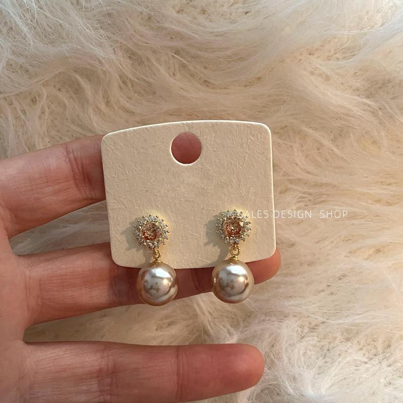 Exquisite French Sunflower Pearl Zircon Stud Earrings - High-End, Versatile & Luxurious
Exquisite French Sunflower Pearl Zircon Stud Earrings - High-End, Versatile & Luxurious