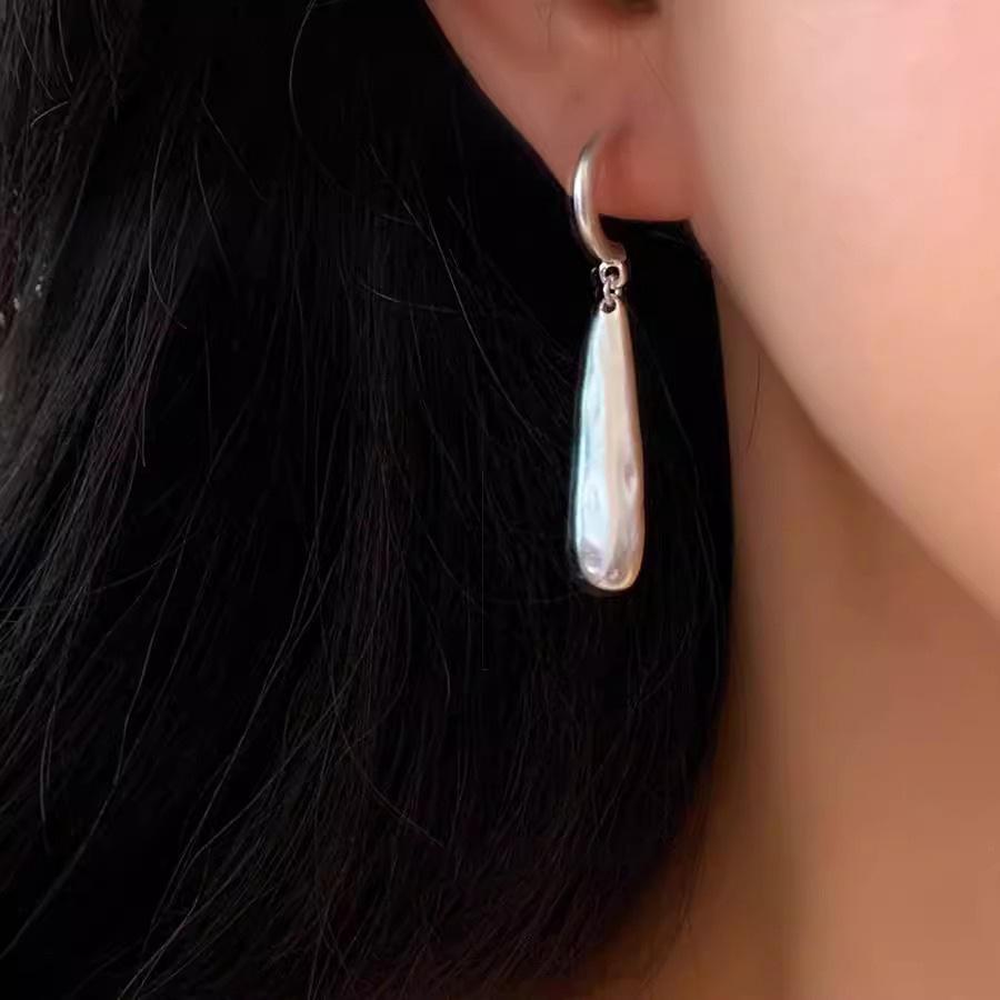 Niche Matte Dimple Water Drop 925 Sterling Silver Earrings for Women, All-Match Fashion Style. EH2992 
Niche Matte Dimple Water Drop 925 Sterling Silver Earrings for Women, All-Match Fashion Style. EH2992