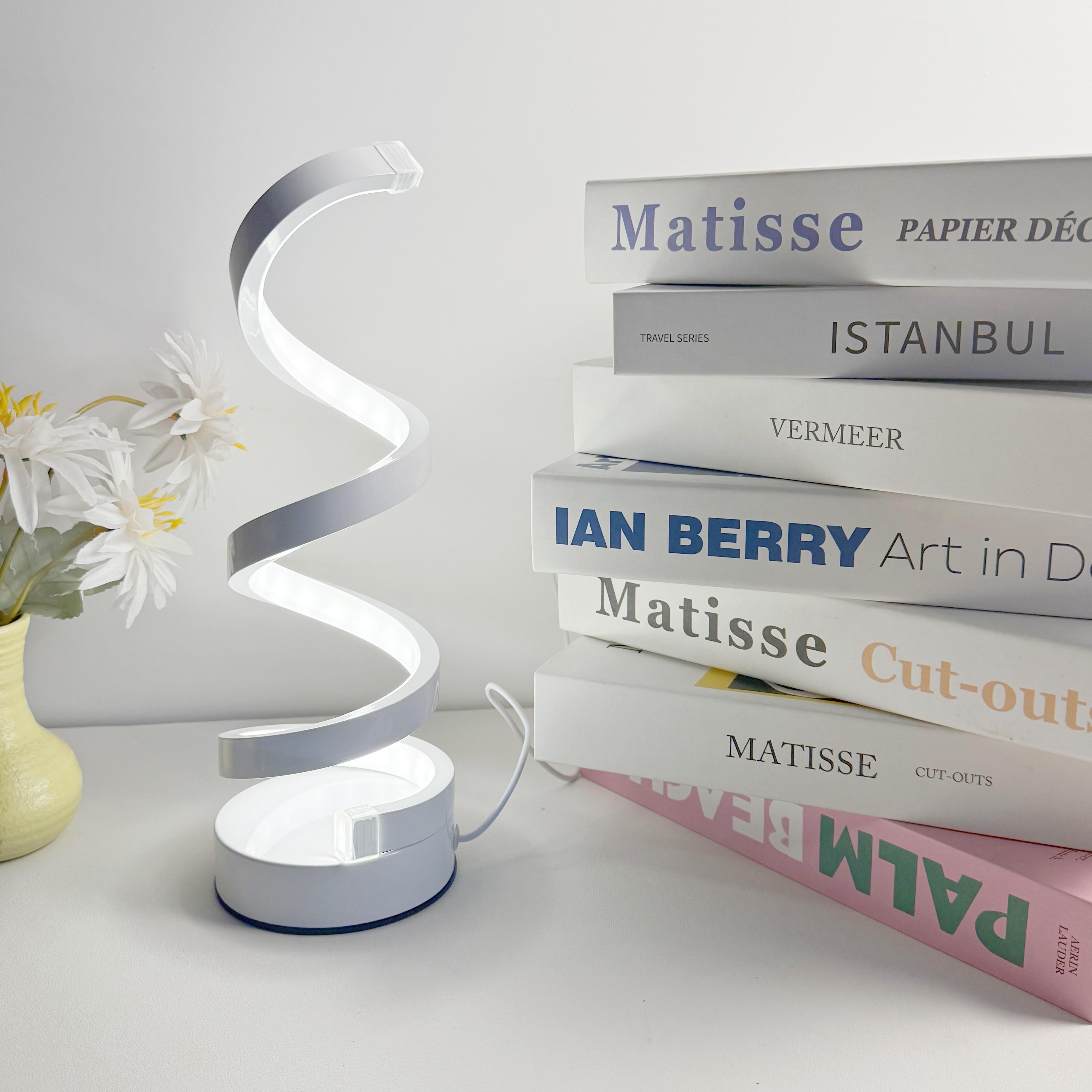 A modern, elegant white spiral desktop lamp, powered by USB with three-color dimming, suitable for various types of rooms. three-color dimming білий
A modern, elegant white spiral desktop lamp, powered by USB with three-color dimming, suitable for various types of rooms. three-color dimming білий