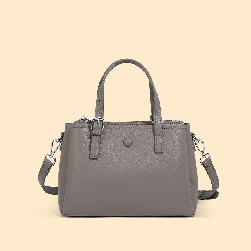 Сумка женская кожаная универсальная для поездок на работу, новая сумка-мессенджер из коровьей кожи через плечо, портативная сумка-тоут
Сумка женская кожаная универсальная для поездок на работу, новая сумка-мессенджер из коровьей кожи через плечо, портативная сумка-тоут