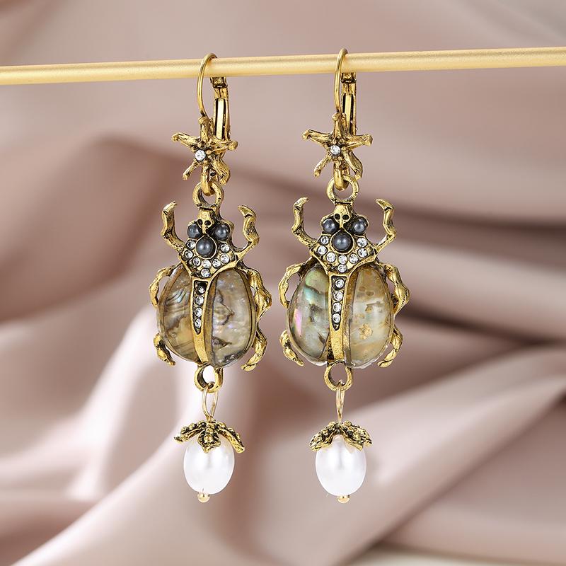 Retro Exaggerated Design Insect Imitation Pearl Pendant Earrings, Women s Personalized Bohemian Holiday Accessory Gifts
Retro Exaggerated Design Insect Imitation Pearl Pendant Earrings, Women s Personalized Bohemian Holiday Accessory Gifts