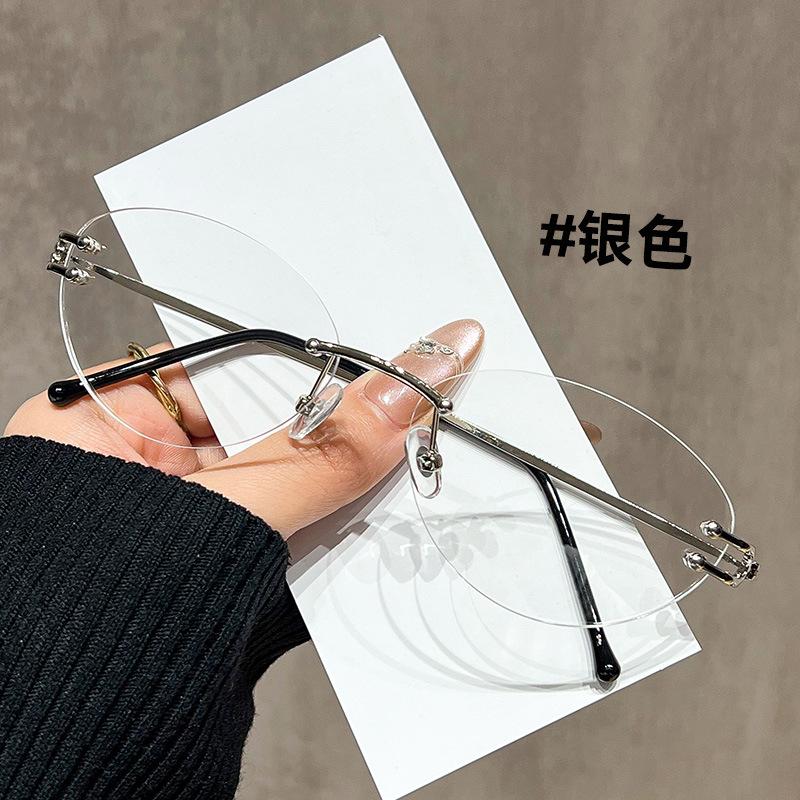 Korean version of retro cat s eye silver rimless glasses women s high-end oval flat glasses can be matched with degree myopia frames серебряный
Korean version of retro cat s eye silver rimless glasses women s high-end oval flat glasses can be matched with degree myopia frames серебряный