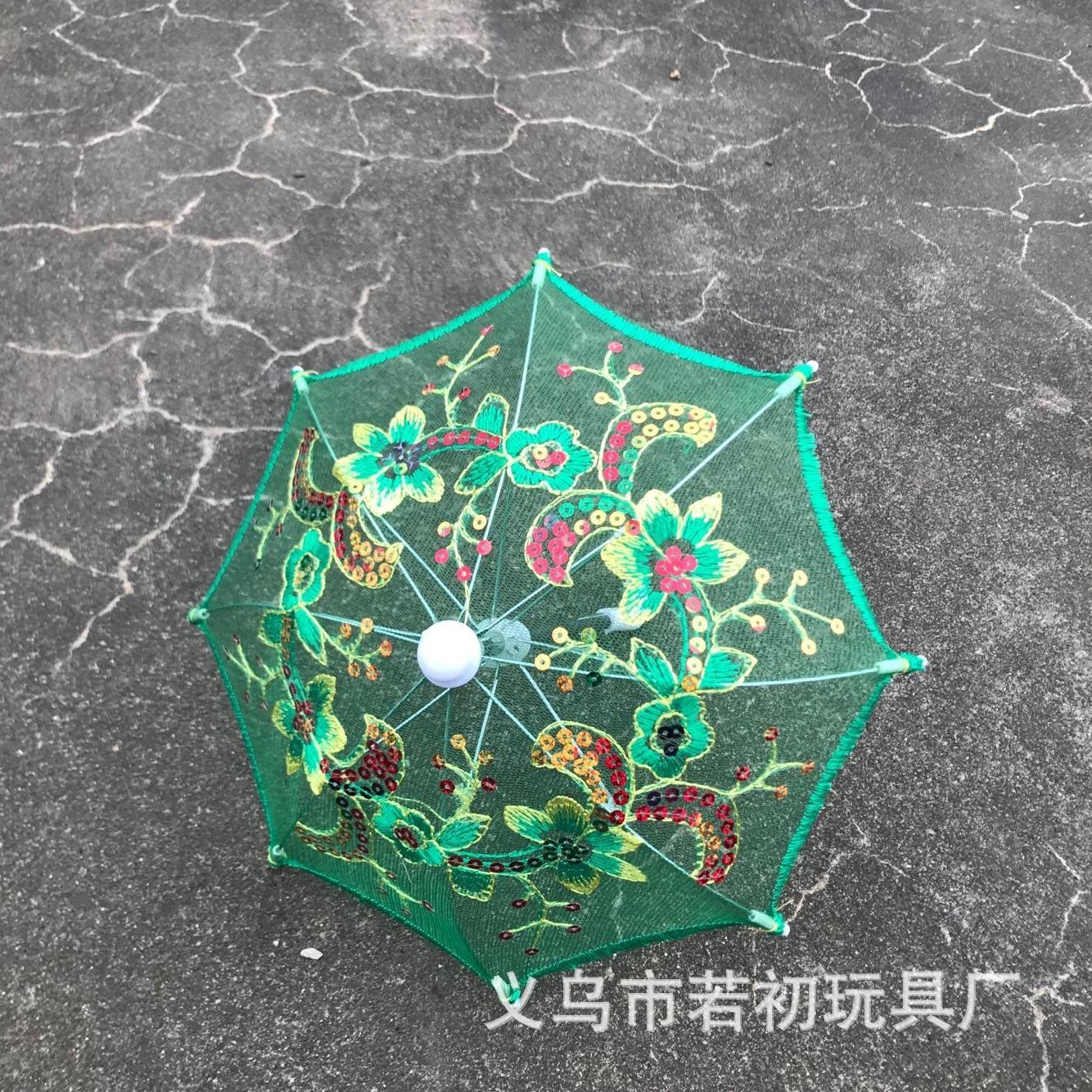Decorative Miniature Umbrella for Photography Props and Toy Displays with Embroidered Floral Pattern and Lightweight Frame Suitable for Various Uses
Decorative Miniature Umbrella for Photography Props and Toy Displays with Embroidered Floral Pattern and Lightweight Frame Suitable for Various Uses