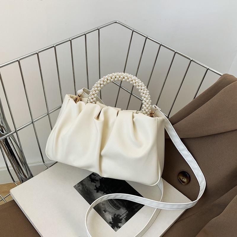 The Cloud Bag Is A Fashionable Hand-held Small Bag That Is Simple and Stylish. It Is A Single-shoulder Crossbody Bag брудно-білий
The Cloud Bag Is A Fashionable Hand-held Small Bag That Is Simple and Stylish. It Is A Single-shoulder Crossbody Bag брудно-білий