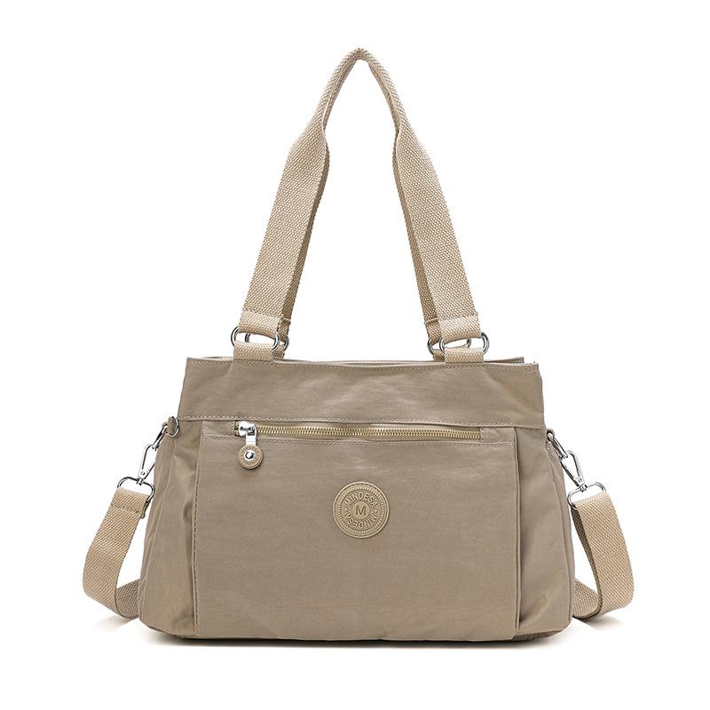 Fashionable Casual Women S Crossbody Bag Simple Versatile Lightweight Multi-Pocket Large Capacity Nylon Shoulder Bag For Moms Quality 34*14 * 23cm
Fashionable Casual Women S Crossbody Bag Simple Versatile Lightweight Multi-Pocket Large Capacity Nylon Shoulder Bag For Moms Quality 34*14 * 23cm
