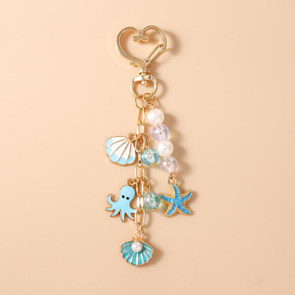 Cute Enamel Shell Starfish Keychain Pearl Beads Key Ring Pendant for Women Girls Handbag Decor DIY Key Chain Jewelry Gifts
Cute Enamel Shell Starfish Keychain Pearl Beads Key Ring Pendant for Women Girls Handbag Decor DIY Key Chain Jewelry Gifts