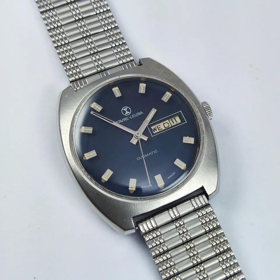 Восстановленные наручные часы Favre Leuba Duomatic с синим циферблатом Day Date 17 Jewels 908 FHF
Восстановленные наручные часы Favre Leuba Duomatic с синим циферблатом Day Date 17 Jewels 908 FHF