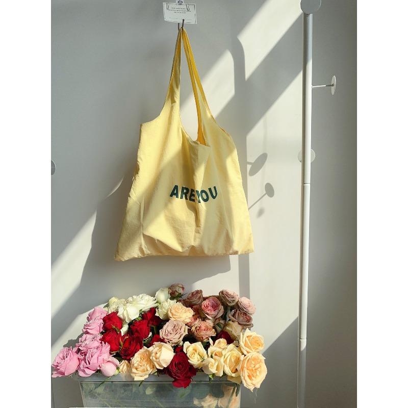 Small fresh letter printed canvas bag versatile shoulder handbag large capacity versatile student shopping bag tide
Small fresh letter printed canvas bag versatile shoulder handbag large capacity versatile student shopping bag tide