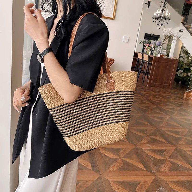 Summer 2026 Striped Straw Shoulder Bag - Large Capacity, Versatile, Fashionable Beach Tote for Women
Summer 2026 Striped Straw Shoulder Bag - Large Capacity, Versatile, Fashionable Beach Tote for Women