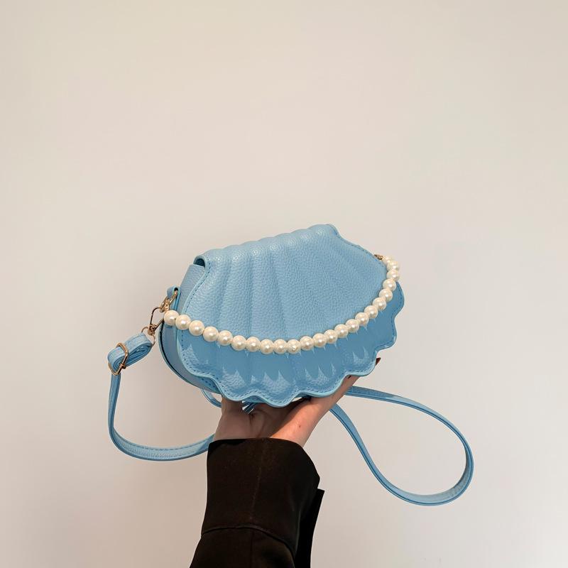 Нежная текстура жемчужная цепочка маленькая сумка женщины 2025 год популярная в этом году корейская версия универсальная ins сумка-мессенджер сумка-ракушка женская синий
Нежная текстура жемчужная цепочка маленькая сумка женщины 2025 год популярная в этом году корейская версия универсальная ins сумка-мессенджер сумка-ракушка женская синий