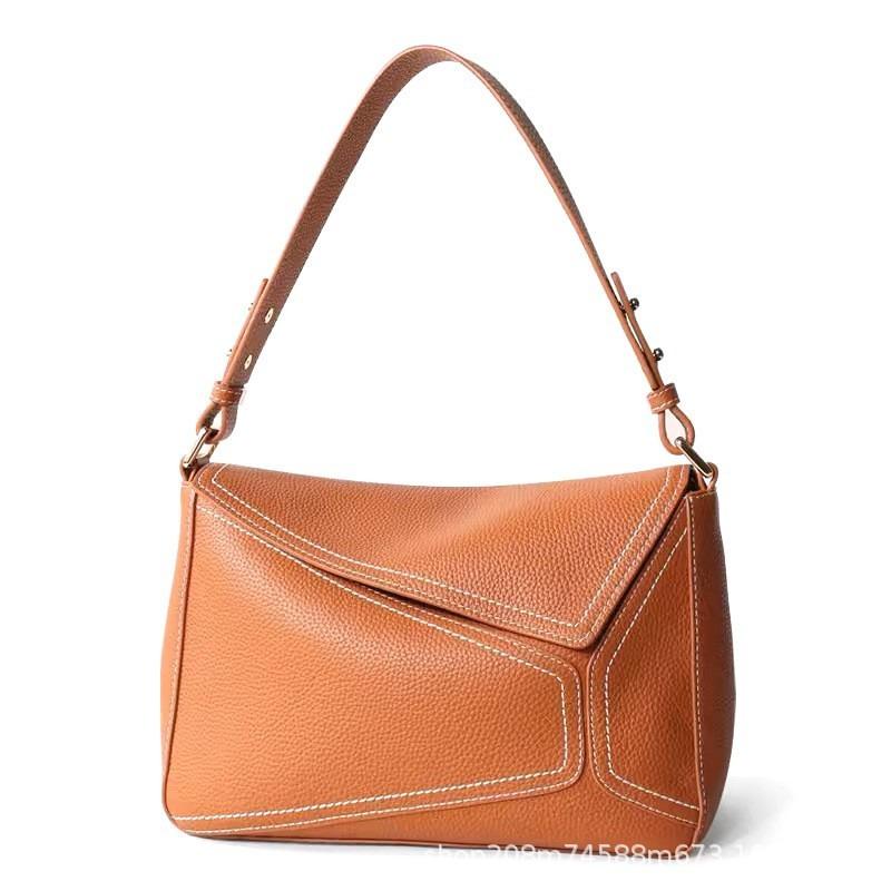 New women s bag single shoulder armpit bag pillow bag first layer cowhide messenger commuter bag genuine leather fashion geometric bag 25*10*18cm коричневий
New women s bag single shoulder armpit bag pillow bag first layer cowhide messenger commuter bag genuine leather fashion geometric bag 25*10*18cm коричневий