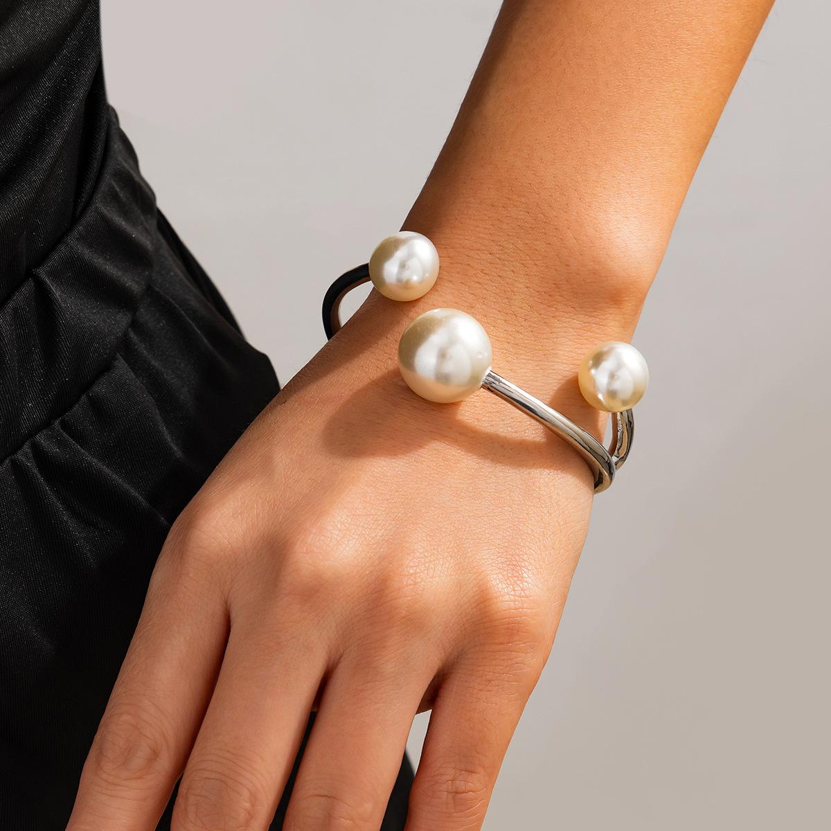 Cold personality irregular line spring opening bracelet retro bracelet imitation pearl jewelry
Cold personality irregular line spring opening bracelet retro bracelet imitation pearl jewelry