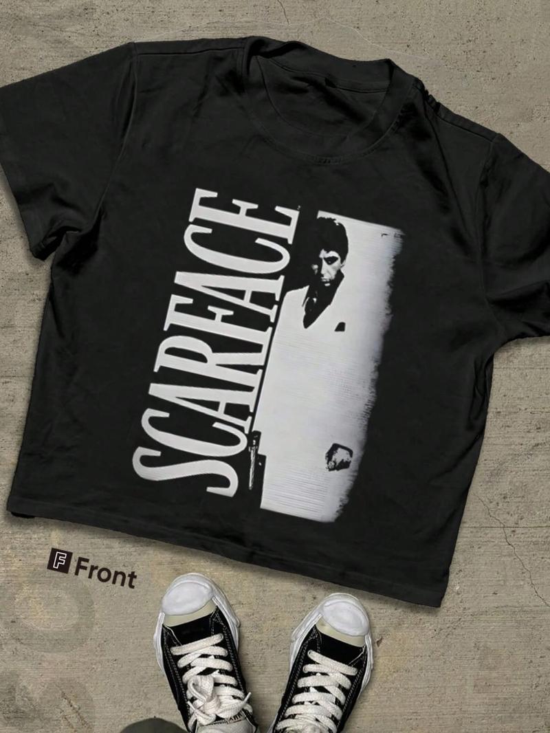 Classic black cropped top adorned with movie striking vertical text and iconic character designs Couples loosefitting shirt S
Classic black cropped top adorned with movie striking vertical text and iconic character designs Couples loosefitting shirt S