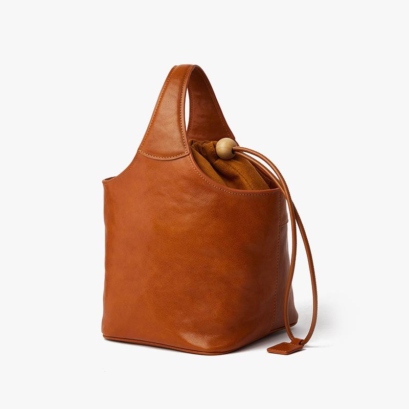 Сумка-корзина из натуральной кожи в стиле ретро с эксклюзивным дизайном, модная корзина для овощей, стильный дизайн и сумка-ведро для поездок на работу
Сумка-корзина из натуральной кожи в стиле ретро с эксклюзивным дизайном, модная корзина для овощей, стильный дизайн и сумка-ведро для поездок на работу