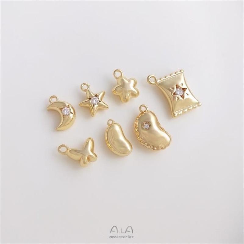 14K Gold Filled Star, Moon, Butterfly, Flower, and Candy Charm Pendant for DIY Bracelets
14K Gold Filled Star, Moon, Butterfly, Flower, and Candy Charm Pendant for DIY Bracelets