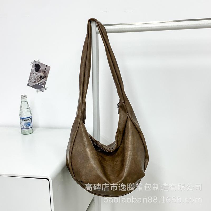 Retro men s and women s shoulder bags Crossbody dumpling bags Large capacity tote bags Fashion bags Student leisure bags чорний
Retro men s and women s shoulder bags Crossbody dumpling bags Large capacity tote bags Fashion bags Student leisure bags чорний