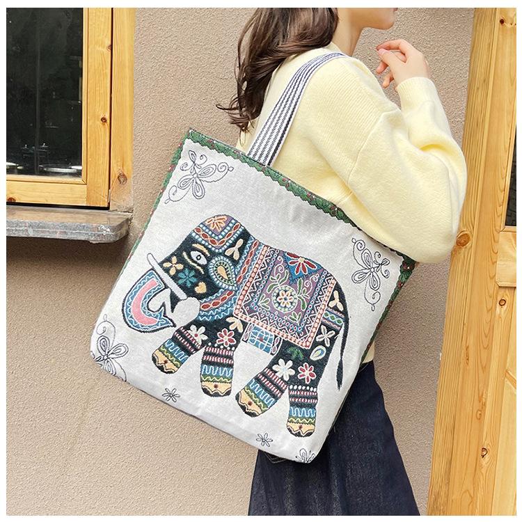 Thai tote bag embroidery elephant fashion shoulder women s bag new women s handheld canvas large capacity tote bag 45x39x10
Thai tote bag embroidery elephant fashion shoulder women s bag new women s handheld canvas large capacity tote bag 45x39x10