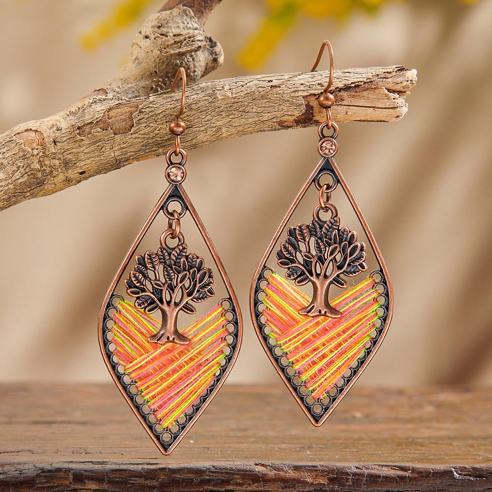 Boho Vacation Style Earrings Vintage Handmade Silk Winding Tree of Life Design Petal-shaped Daily Wear Parties Decors Versatile
Boho Vacation Style Earrings Vintage Handmade Silk Winding Tree of Life Design Petal-shaped Daily Wear Parties Decors Versatile