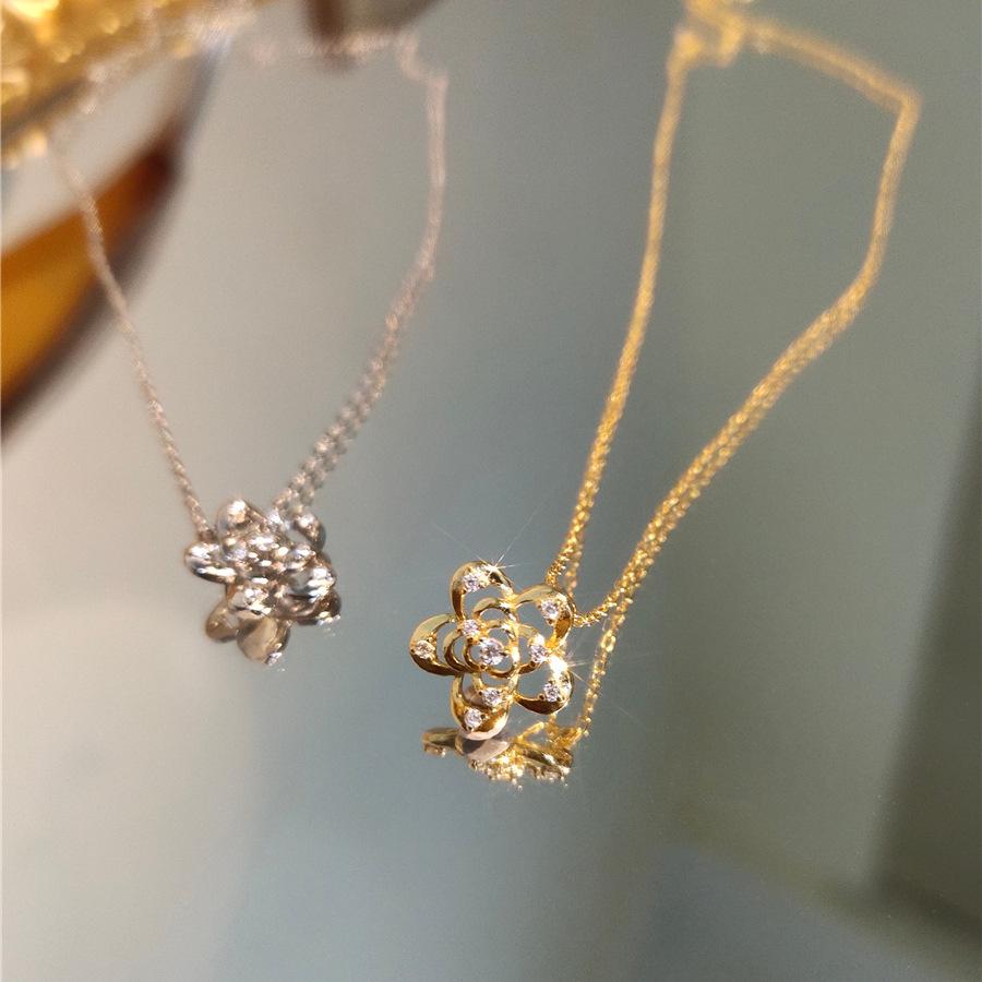 French Retro Camellia Pendant Necklace: Inlaid Diamond, Hollow Design, 925 Sterling Silver, Gold-Plated, Exquisite Sweater Chain for Women. 925 Silver
French Retro Camellia Pendant Necklace: Inlaid Diamond, Hollow Design, 925 Sterling Silver, Gold-Plated, Exquisite Sweater Chain for Women. 925 Silver