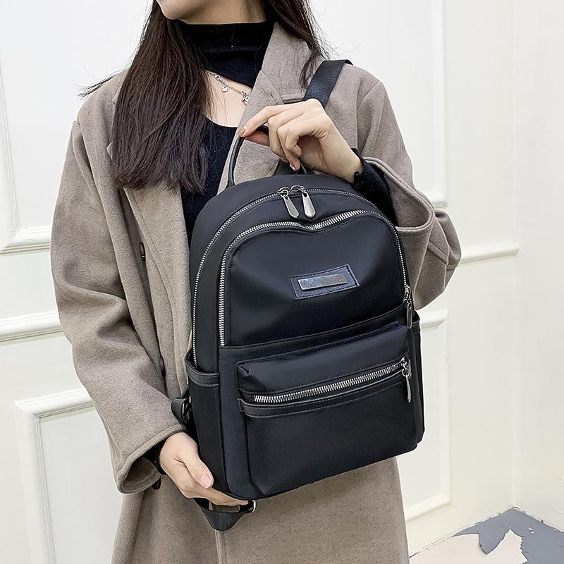 Daily travel commute simple small backpack spring and summer new large-capacity shoulder backpack
Daily travel commute simple small backpack spring and summer new large-capacity shoulder backpack