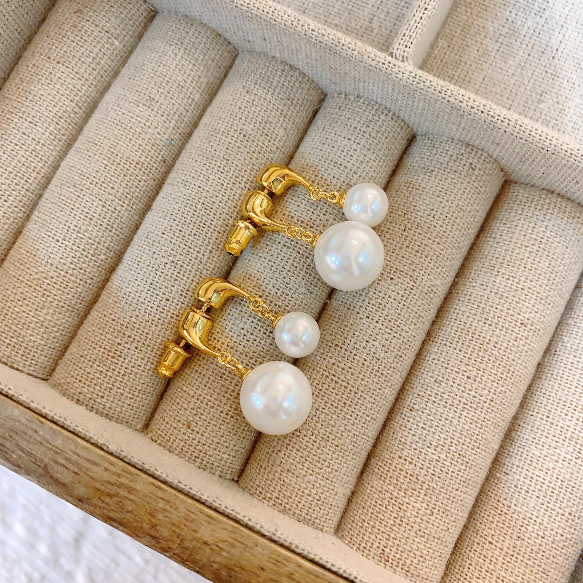 Премиум-размер жемчуга двухцветный темперамент, множество способов ношения женских сережек, иглы для ушей
Премиум-размер жемчуга двухцветный темперамент, множество способов ношения женских сережек, иглы для ушей