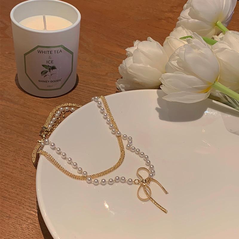 Early Spring Spring Pearl Bow Choker Necklace Women S Double Temperament Simple Collarbone Chain Pearl Neck Chain
Early Spring Spring Pearl Bow Choker Necklace Women S Double Temperament Simple Collarbone Chain Pearl Neck Chain