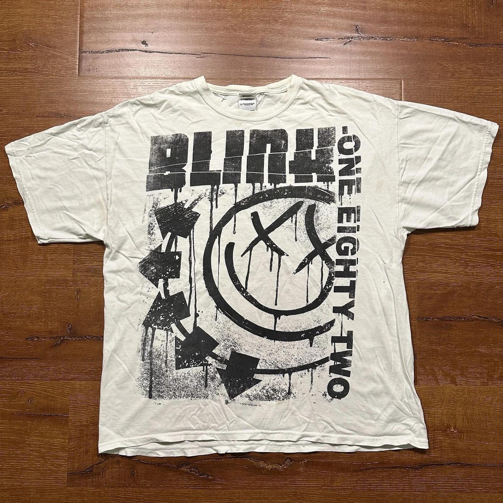 Винтажная футболка Blink 182 Мужская XL Белая Смайлик Панк-группа 90-е Потертая Рок 4XL
Винтажная футболка Blink 182 Мужская XL Белая Смайлик Панк-группа 90-е Потертая Рок 4XL